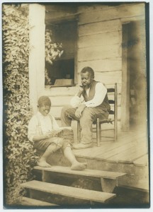 Black boy reads to his father in South Carolina