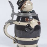 A barrel shaped character stein