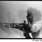 Abbie Hoffman (double exposure) speaking at the Moratorium to End the War in Vietnam protest on Boston Common, April 15, 1970